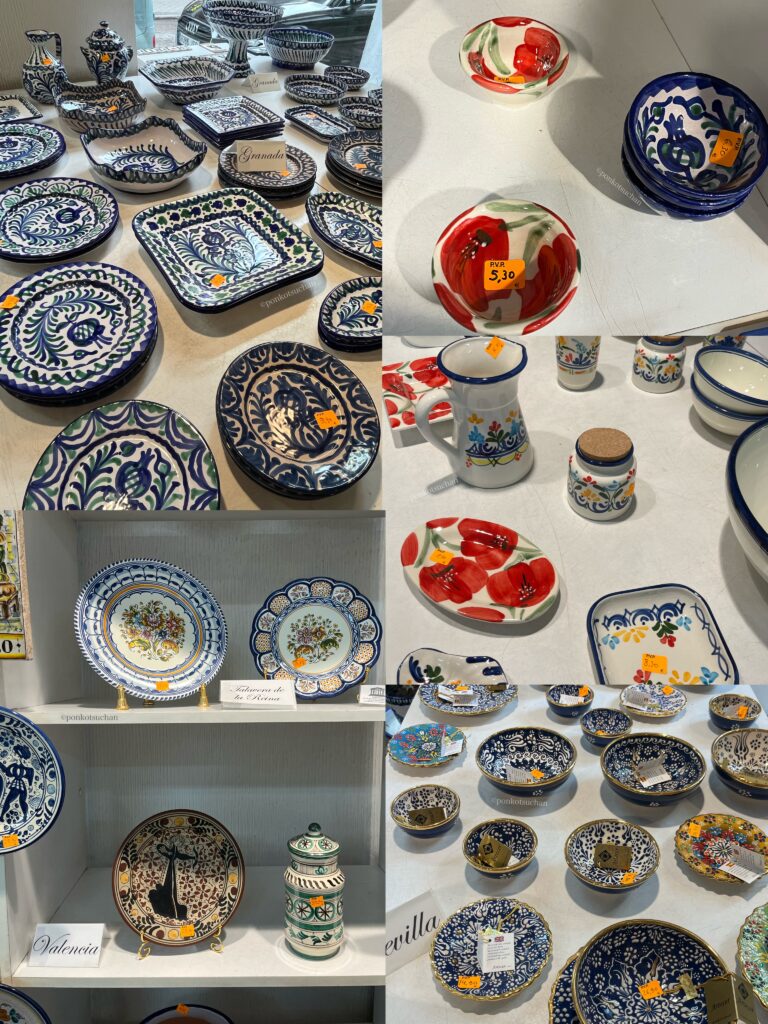 CANTARO店内に並ぶスペイン産ハンドメイド陶器。グラナダ伝統の青×白のレリーフ模様皿や、赤い花柄の小皿・ボウルなど、地方ごとのデザイン違いを比較できる豊富なラインナップ。